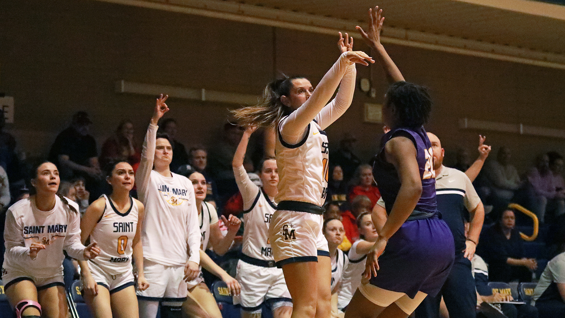 Spires Hit 20-Win Mark After Beating KWU 74-69